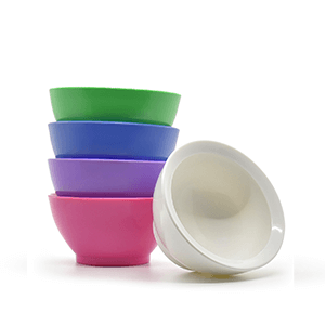 Stack of pink, purple, blue, and green 8 oz bowls, with a white bowl on its side